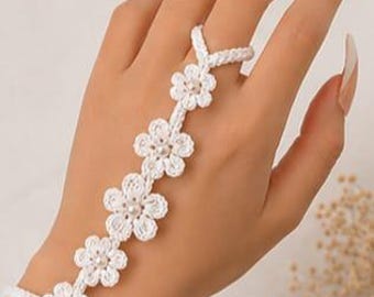 Joya floral para mano