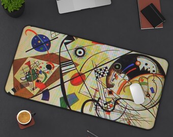 May include: Rectangular mousepad featuring an abstract art design with geometric shapes, lines, and circles in various colors including yellow, brown, red, and blue. A white computer mouse rests on the pad.