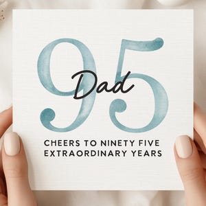 May include: A set of three ceramic mugs with a speckled, matte finish. The mugs are in shades of cream, light gray, and dark gray. Each mug has a simple, minimalist design and a rounded handle.