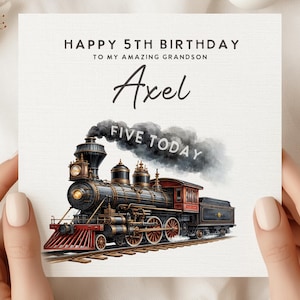 May include: A birthday card with a watercolor illustration of a vintage steam train. The card reads "Happy 5th Birthday to my amazing grandson Axel" with "FIVE TODAY" in the smoke. The train is black, red, and gold.
