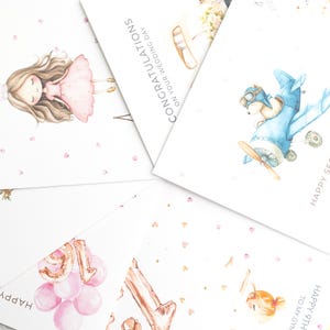 May include: A collection of greeting cards with watercolor illustrations. Designs include a princess, a bear in a biplane, and balloons. Text includes "Happy First Birthday", "Congratulations", and "Happy Second Birthday".