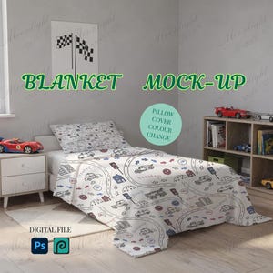 May include: A white blanket and pillow cover set featuring a black, blue, and red graphic print of cars, roads, and traffic signs. The text BLANKET MOCK-UP, PILLOW COVER COLOUR CHANGE, and DIGITAL FILE are visible on the image.