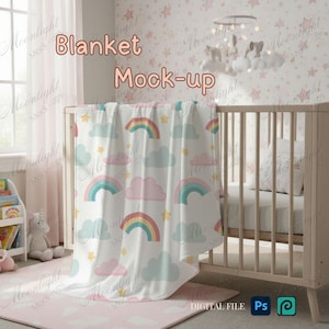 May include: A white baby blanket with a pattern of pastel rainbows, clouds, and stars is draped over a wooden crib. The blanket is part of a nursery theme, with a matching rug and wall decor. The words "Blanket Mock-up" are visible.