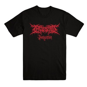 May include: A black short-sleeved t-shirt featuring a red graphic print on the chest. The design displays the word Ingested in a stylized, jagged, thorny font, with the word Denigration printed underneath in a smaller, matching red gothic typeface.