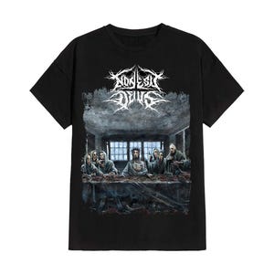 May include: A black short-sleeve t-shirt featuring a white stylized band logo at the top and a detailed graphic print below depicting a dark, somber scene of figures seated at a long table in a dimly lit room with a distressed, textured aesthetic.