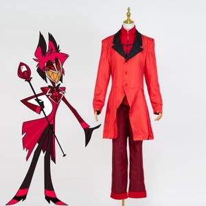 May include: A red cosplay costume displayed on a mannequin next to a cartoon illustration. The costume includes a long red coat with black lapels, red pants, and a black shirt. The cartoon character is red and black with a staff.