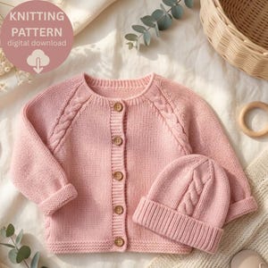 May include: A light pink knitted cardigan and matching beanie set featuring a cable knit pattern along the raglan sleeves and the side of the hat. The cardigan has a round neckline and four wooden buttons down the front. Text reads KNITTING PATTERN digital download.