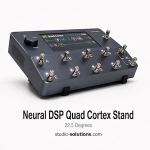 May include: A dark gray Neural DSP Quad Cortex stand with multiple silver foot switches and a screen. The stand is angled at 22.5 degrees and has the text "1C Quad Cortex" and "studio-solutions.com" on it.