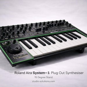 May include: A white ceramic mug with a black handle and the text "But First, Coffee" in a bold, black font. The mug is on a wooden surface. The mug is approximately 10 cm tall.