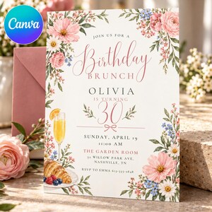 May include: A birthday brunch invitation card featuring watercolour floral illustrations of pink and blue flowers. The text reads: Join us for a Birthday Brunch, Olivia is turning 30, Sunday, April 19, 11:00 AM, The Garden Room, 52 Willow Park Ave, Nashville, TN, RSVP to Emma 615-555-2848.
