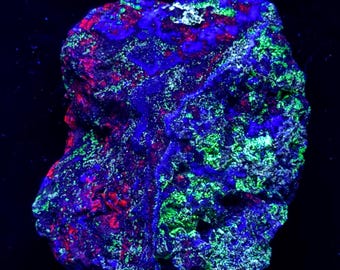 Mineral fluorescente - Red Cloud Arizona - Reactivo a los rayos UV