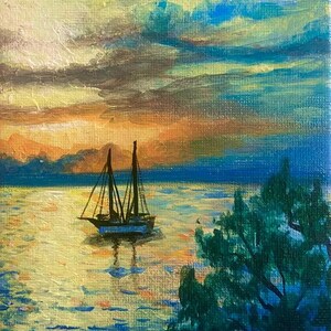 May include: An acrylic painting on canvas depicting a sailboat on water at sunset. The sky features vibrant orange, yellow, and blue clouds. A dark silhouette of a tree is visible in the foreground on the right, while the water reflects the golden light.