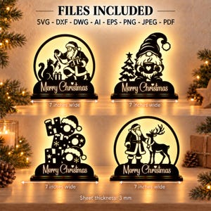 May include: Four black laser-cut Christmas decorations with backlighting. Designs include Santa with a cat, a gnome with a tree, the text HO HO HO, and Santa with a reindeer. Each piece features the text Merry Christmas and is 7 inches wide.