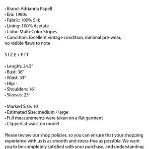 May include: A text description of a vintage Adrianna Papell dress with multi-color stripes. The dress is made of silk and acetate. The measurements are listed: Length: 24.5 inches, Bust: 38 inches, Waist: 34 inches, Shoulders: 16 inches, Sleeves: 23 inches. The dress is in excellent condition with minimal pre-wear.