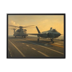 May include: A framed canvas print showing a military aircraft and a helicopter on a carrier deck. The aircraft is a dark grey fighter jet, and the helicopter is a light grey transport. The sky is a warm yellow and orange.