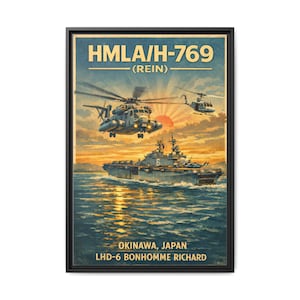 May include: Framed vintage-style print depicting military helicopters and a ship at sea, set against a sunset. The text includes "HMLA/H-769 (REIN)", "OKINAWA, JAPAN", and "LHD-6 BONHOMME RICHARD". The artwork uses blue, orange, and yellow hues.