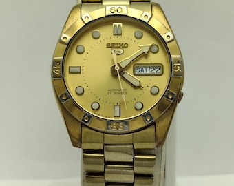 Montre Seiko 5 Automatique - Cadran Et Bracelet Doré - Vintage 21 Rubis - Réf. 7s26-0440