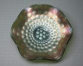 Fenton coin dot carnival glass bowl on green glass