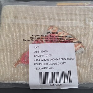 May include: A beaded pouch in a clear plastic bag. The pouch is a light beige color and has an embroidered design in shades of red, orange, and yellow. The pouch is labeled "POUCH OB BEADED CITY".