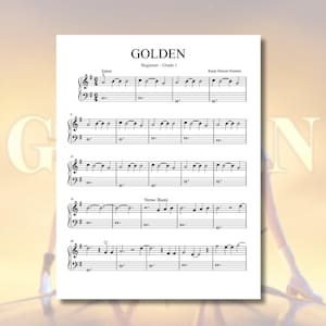 May include: A sheet of music titled "GOLDEN" for beginner piano players. The sheet music is printed in black ink on white paper and includes musical notation, lyrics, and the text "Kpop Demon Hunters".