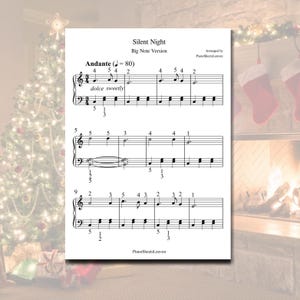 May include: Sheet music for "Silent Night" in a big note version. The music is arranged for piano and includes the tempo marking "Andante (♩=80)". The text "dolce sweetly" is also included. The sheet music is printed on white paper.