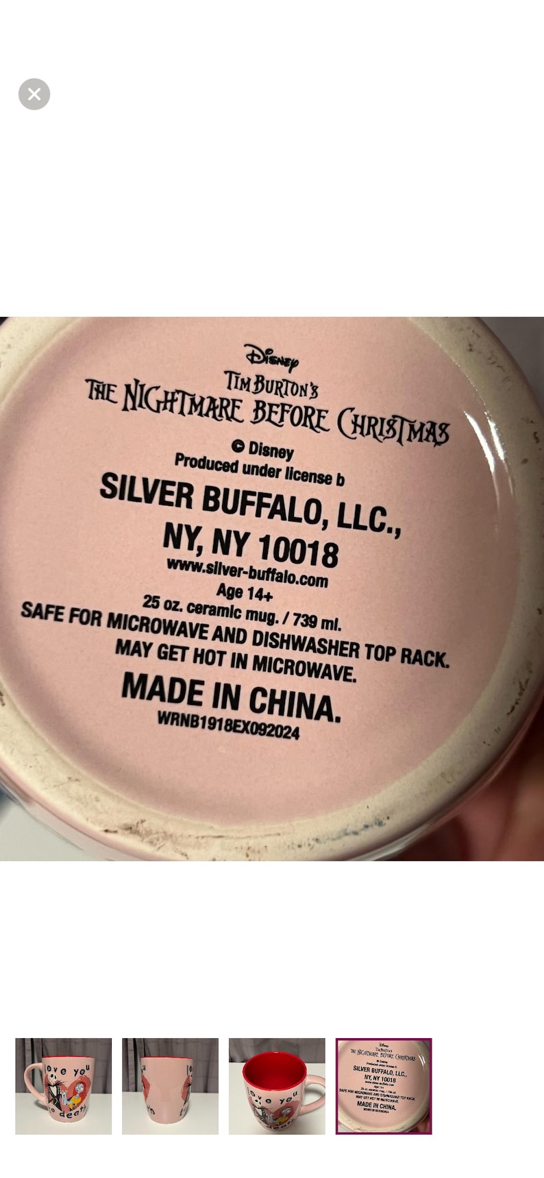 May include: A pink ceramic mug with text from Tim Burton's "The Nightmare Before Christmas." The mug is 25 oz. and safe for microwave and dishwasher use. Made in China.