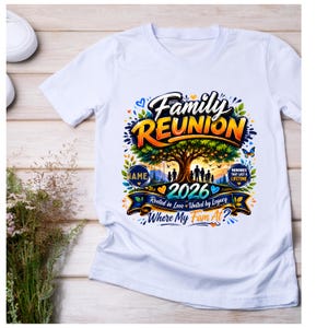 May include: A white t-shirt featuring a colorful graphic of a tree with a family silhouette underneath. The text reads Family Reunion, 2026, Rooted in Love United by Legacy, Where My Fam At, Name, and Memories That Last a Lifetime with butterflies.
