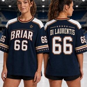 May include: Two navy blue hockey jerseys with white and gold accents. One jersey reads "BRIAR 66" and the other reads "DI LAURENTIS 66". Both jerseys have a star on the front and stars on the sleeves.