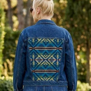 Fabulous denim jacket with Pendleton Jacquard on the back and shoulders. Upcycled, bold, and one of a kind. Size Women’s XL