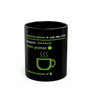 May include: Black coffee mug with green text and a coffee cup graphic. The text reads "root@coffee-machine:~# sudo make coffee" and "Access granted". A pixelated coffee cup design is also featured.