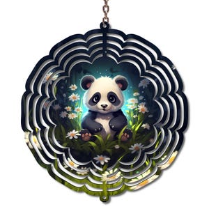 May include: A decorative panda bear wind spinner. The panda is black and white, sitting in a field of daisies. The outer frame is a layered, black, floral design, suspended by a chain.