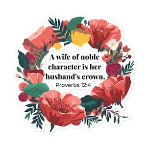 May include: A sticker featuring a floral wreath design with red, pink, yellow, and green flowers. The text reads, "A wife of noble character is her husband's crown. Proverbs 12:4."