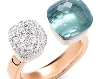 Anello Nudo in oro massiccio con diamante 39 (0,8 carati) e topazio azzurro cielo.