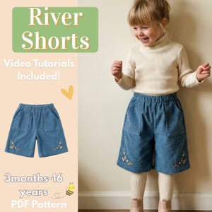May include: A child wearing blue corduroy shorts with floral embroidery. The shorts have pockets and an elasticated waistband. The image includes text: "River Shorts", "Video Tutorials Included!" and "3 months-16 years PDF Pattern".