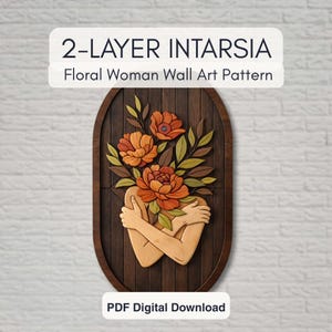 May include: A 2-layer intarsia floral woman wall art pattern. The wooden artwork features a woman embracing herself, with a bouquet of orange flowers and green leaves. The artwork is set against a dark brown, oval-shaped wooden background.