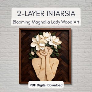 May include: 2-Layer Intarsia wood art titled "Blooming Magnolia Lady." The artwork features a woman's form with magnolia flowers. The frame is dark brown, and the background is a light brick wall. The text "PDF Digital Download" is at the bottom.