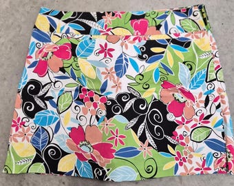 Falda pantalón floral talla 12, colorida, con estampado llamativo, de algodón elástico.