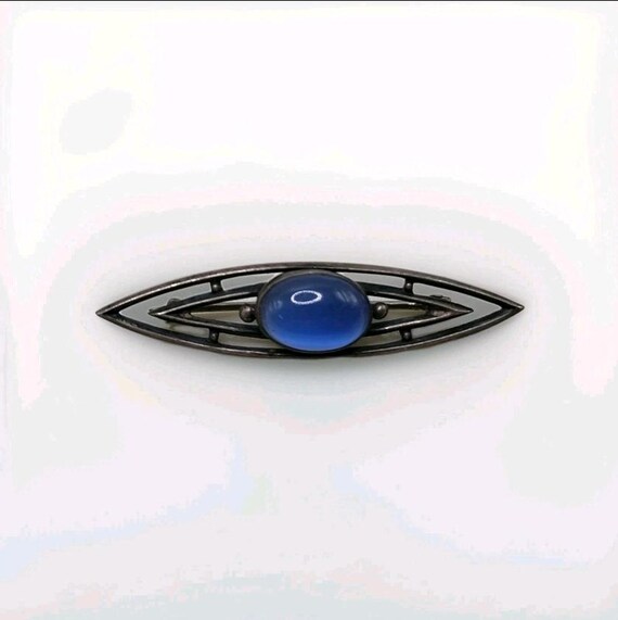 Art Deco Style Silver Tone Brooch With Blue Glass Cabochon  display picture 2