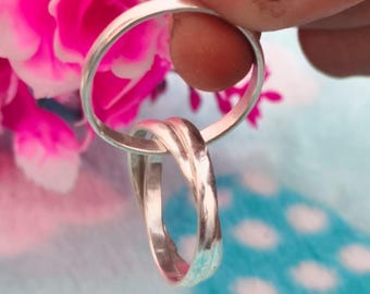 スターリングシルバーのロシアンローリングリング｜ミニマリストなインターロッキングバンド