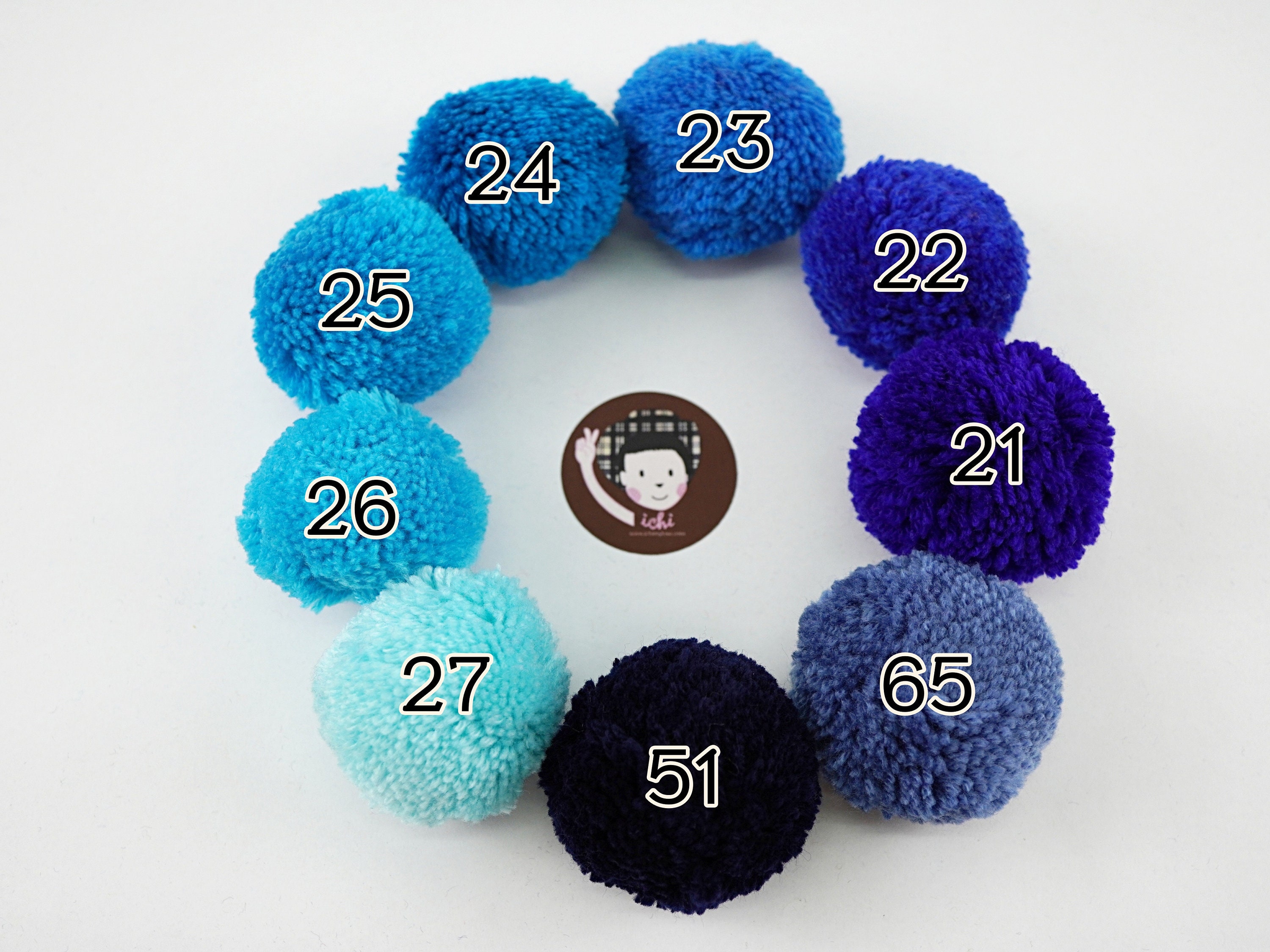 14 Homemade Blue Yarn Pom Poms