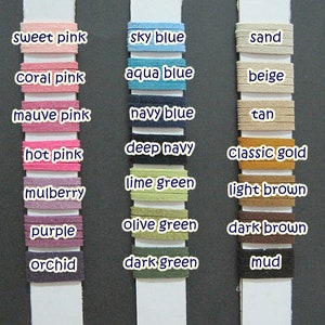 May include: A colour chart displaying 30 different colours of leather cord. The colours are arranged in columns and labelled with their names. The colours include white, cream, yellow, orange, tangerine, red, ruby, burgundy, sweet pink, coral pink, mauve pink, hot pink, mulberry, purple, orchid, sky blue, aqua blue, navy blue, deep navy, lime green, olive green, dark green, sand, beige, tan, classic gold, light brown, dark brown, mud, warm grey, silver, light grey, grey, steel, dark grey, and black.