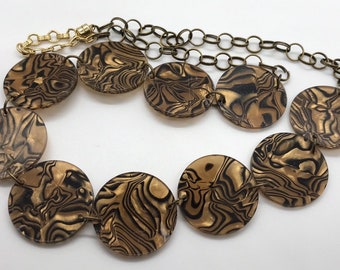 Fields of Gold: Handmade Necklace Featuring Flat Round Acrylic Beads with Paua Shell Pattern