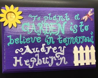 Hand Painted Wooden Sign Featuring Quote from Audrey Hepburn: To Plant a Garden is to Believe in Tomorrow