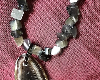 Rock On: Handmade Necklace Featuring Slice of Rock Pendant