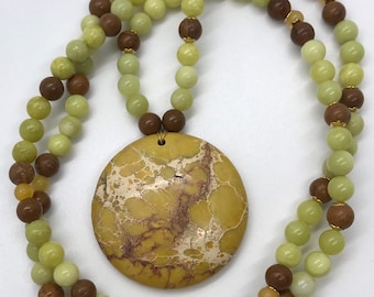 Sunny Side Up: Handmade Necklace Featuring Round Yellow Magnesite Pendant and Green and Brown Stone Beads