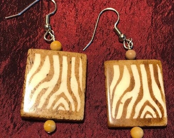 Trojan Horse: Handmade Earrings Featuring Zebra Print Wooden Beads