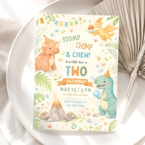 May include: A two-year-old birthday party invitation with dinosaur illustrations. The invitation features the text "STOMP CHOMP & CHEW! Our little dino is TWO." The date and time are also included. The invitation is decorated with colorful graphics.