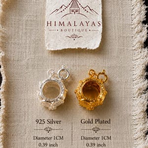 May include: Two circular pendants, one in 925 silver and one gold-plated, each with a 1 cm or 0.39 inch diameter. The text Himalayas Boutique is printed above the pendants, with labels 925 Silver and Gold Plated below each respective item.