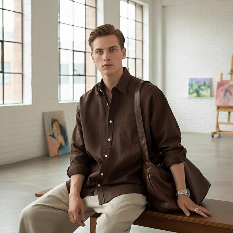 Brown linen cotton long sleeve men’s shirt with leather bag, soft casual fashion look