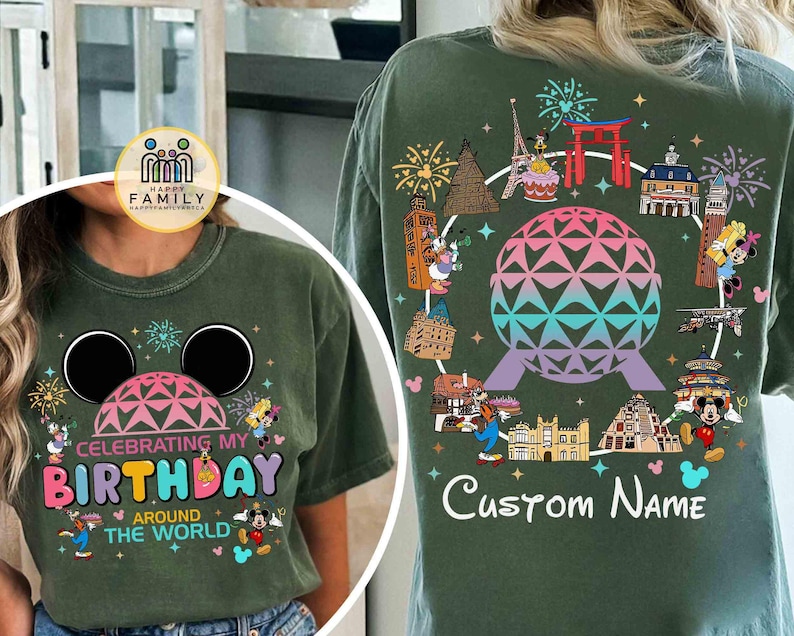 May include: Green t-shirt with a colorful graphic design. The front features a Mickey Mouse head, a geometric shape, and the text "Celebrating My Birthday Around The World." The back has a globe design surrounded by landmarks and characters.